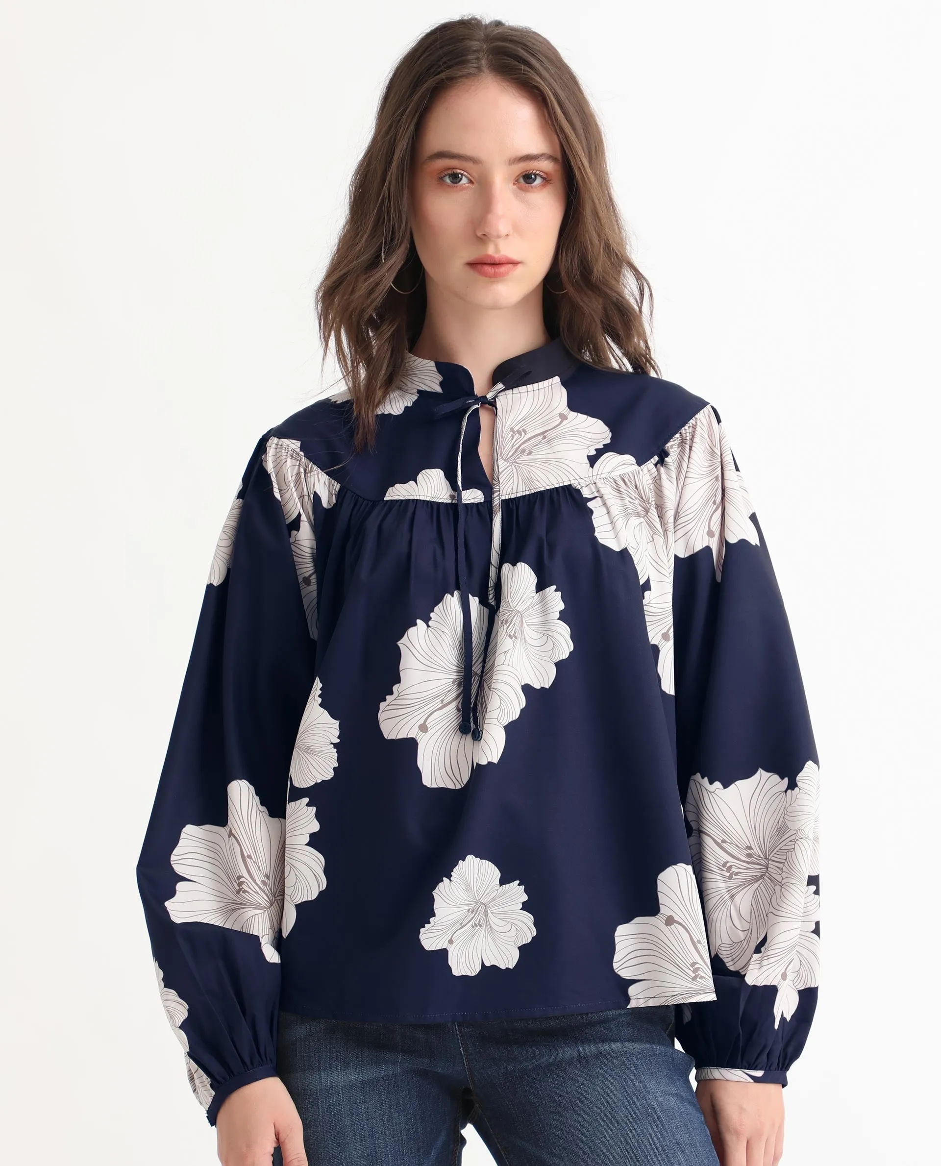 Rareism Women Azure Dark Navy Polyester Fabric Full Sleeves Tie-Up Closure High Neck Bishop Sleeve Relaxed Fit Floral Print Top