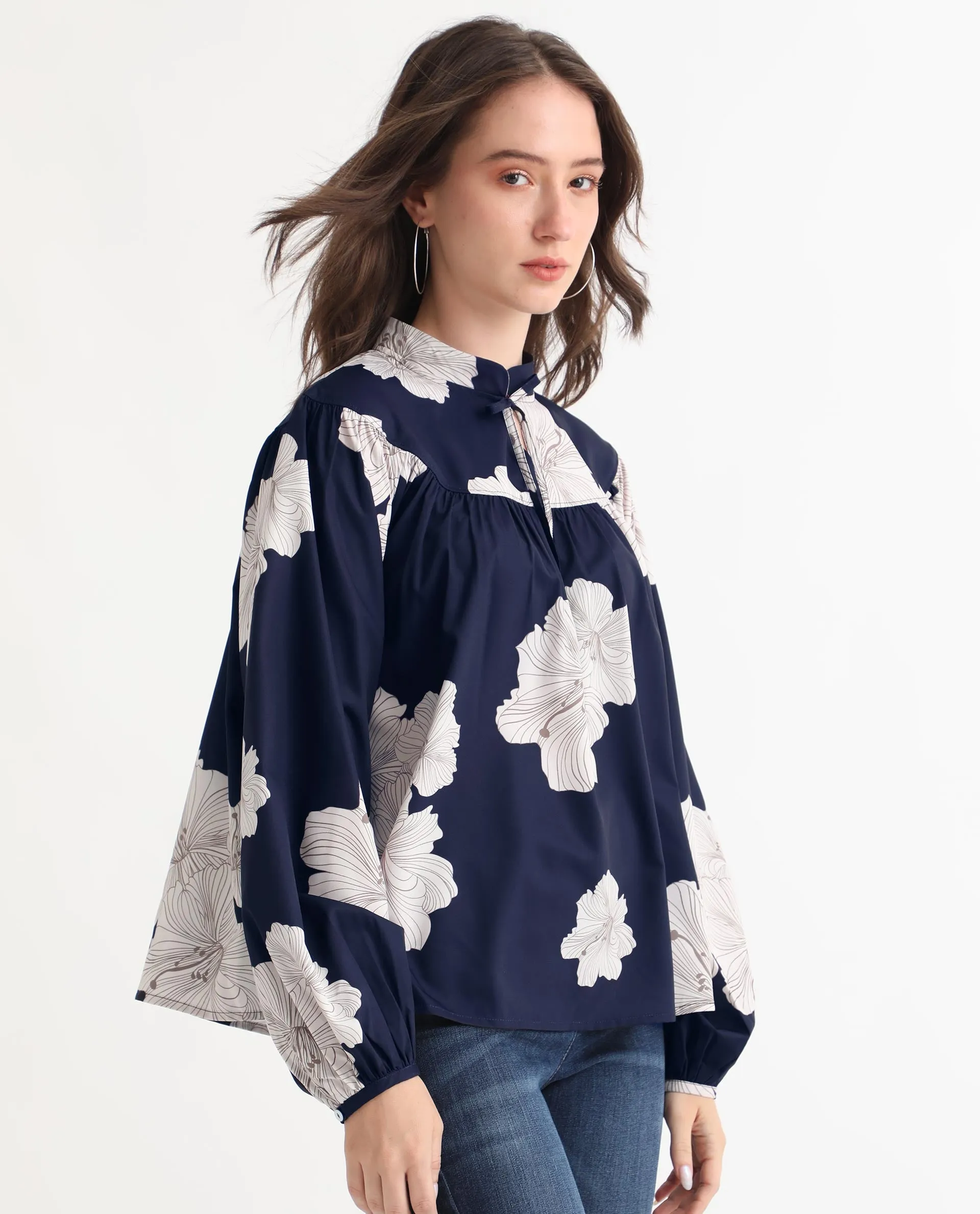 Rareism Women Azure Dark Navy Polyester Fabric Full Sleeves Tie-Up Closure High Neck Bishop Sleeve Relaxed Fit Floral Print Top